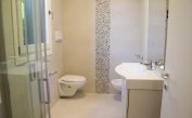apartments Residenza GREEN MARINE: C8/4 - bathroom with a shower enclosure (example)