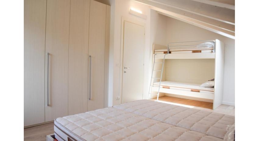 appartamenti Residenza GREEN MARINE: C8 - camera con letto a castello (esempio)